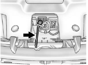 GMS Sierra: Hood. 2. Go to the front of the vehicle and locate the secondary hood release. This is located under the hood, near the center of the grille.